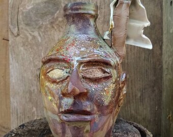 house FACE JUG by Joel Patton, ash glaze: "I'm told it doesn't pay"