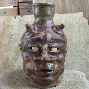 May include: A rustic wooden sign with the text "Welcome to our home" in white lettering. The sign has a distressed finish and a simple, inviting design, ideal for a hallway or porch.