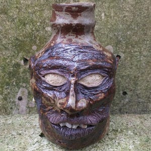 Worried face jug by Joel Patton