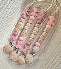 Personalised Dummy Clip Bow: Pink Crochet Bead, Pacifier Holder product logo
