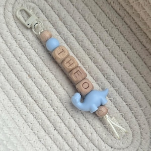 Llavero personalizado con nombre de dinosaurio: etiqueta para mochila escolar con cuentas, ideal para rellenar calcetines navideños. imagen 5