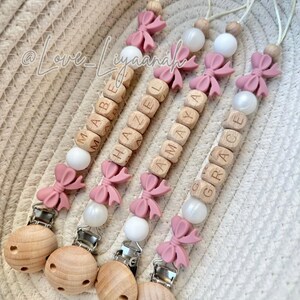 Personalised dummy clip bow: pink pacifier holder, pearl beaded