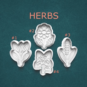 May include: A white ceramic mug with a black handle and the text "But First, Coffee" in a bold, black font. The mug is set against a blurred background, suggesting a cozy setting.