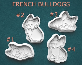 May include: Four white plastic French Bulldog cookie cutters in various poses are shown against a teal background. The text "FRENCH BULLDOGS" is at the top. Each cutter is numbered from 1 to 4.