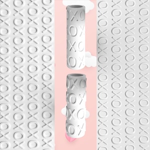 May include: White cylindrical object with embossed XOXO pattern. The object is a solid white color and has a smooth, matte finish. The background is a light pink with white clouds and a pink heart.