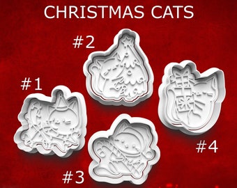 May include: Four white plastic cookie cutters in the shape of cats with Christmas themes. The cutters are numbered 1 through 4. The text "CHRISTMAS CATS" is at the top of the image.