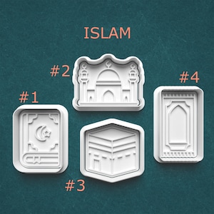 May include: White plastic cookie cutters with Islamic symbols. The cutters include a book with a crescent moon and star, a mosque, the Kaaba, and a prayer rug. The word "ISLAM" is printed in orange at the top.