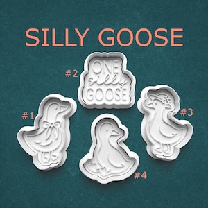 May include: Four white plastic cookie cutters in the shape of geese. One cutter has the words "ONE silly GOOSE" and the others have different goose designs. The text "SILLY GOOSE" is at the top of the image.