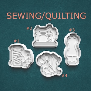 May include: Four white plastic cookie cutters for sewing and quilting. The cutters include a spool of thread with buttons, a sewing machine, a dress form, and scissors with thread. The words "SEWING/QUILTING" are in orange text at the top.