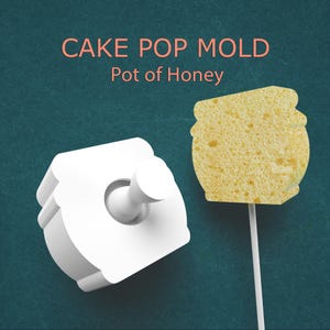 May include: White cake pop mold with a cylindrical handle and a pot-shaped cavity. A yellow cake pop in the shape of a honey pot is on a white stick. Text reads "CAKE POP MOLD Pot of Honey."