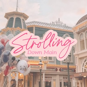May include: A cluster of Mickey Mouse shaped balloons in white, red, and blue, positioned in front of a light-colored building with architectural details. The text Strolling Down Main is overlaid in a pink script font across the center.