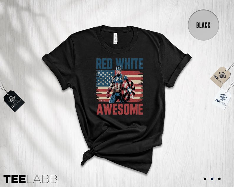 May include: A black short-sleeve t-shirt featuring a graphic of Captain America standing in front of a distressed American flag. The text RED WHITE is printed in blue above the character, and the word AWESOME is printed in red below the character.
