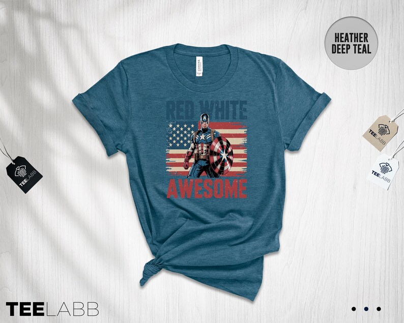 May include: A heather deep teal short-sleeve t-shirt featuring a graphic of Captain America in front of a distressed American flag. The text RED WHITE is printed in blue above the character, and the word AWESOME is printed in red below.