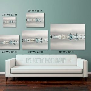 May include: A photograph of a glacial lake with icebergs reflecting in the water. The image is available in various sizes, from 14 inches by 11 inches to 40 inches by 30 inches.