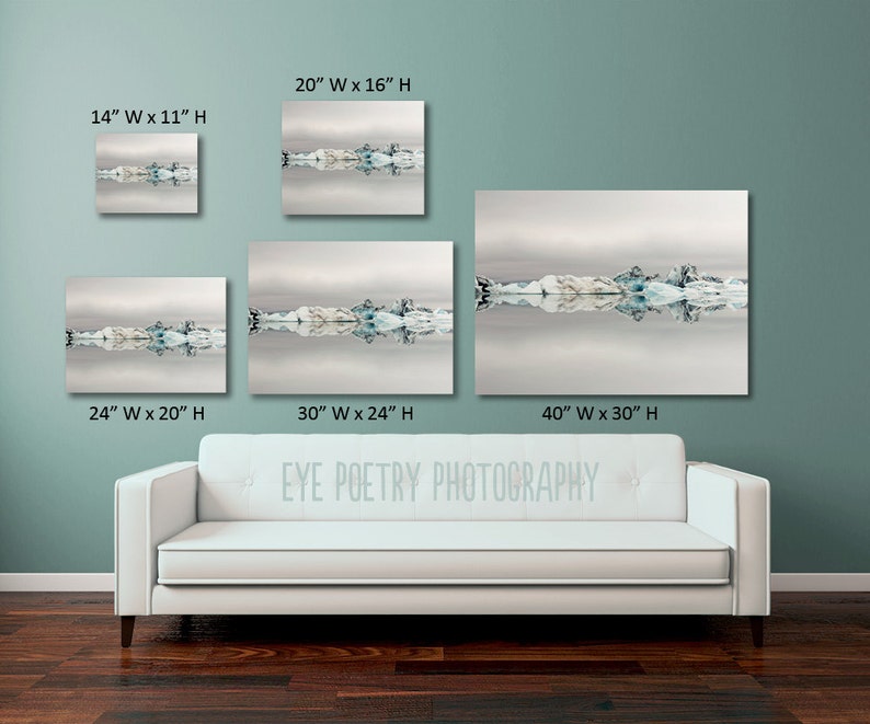 May include: A photograph of a glacial lake with icebergs reflecting in the water. The image is available in various sizes, from 14 inches by 11 inches to 40 inches by 30 inches.