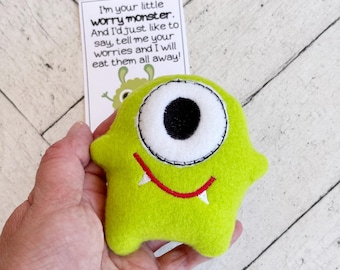 Peluche mostro con un occhio solo: creatura verde confortante, amico delle preoccupazioni