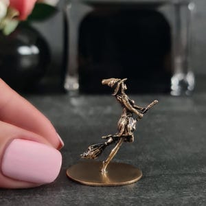 Witch figurine vintage style Bronze Halloween witch decor Witch on a broom statuette Halloween gifts Witch with hat