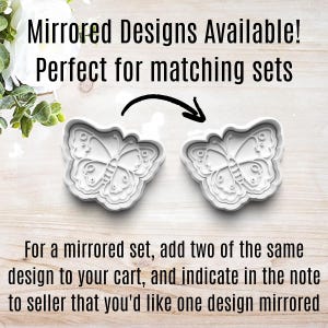 May include: Two white plastic butterfly cookie cutters. The cookie cutters are mirrored images of each other. The text "Mirrored Designs Available! Perfect for matching sets" is at the top of the image.