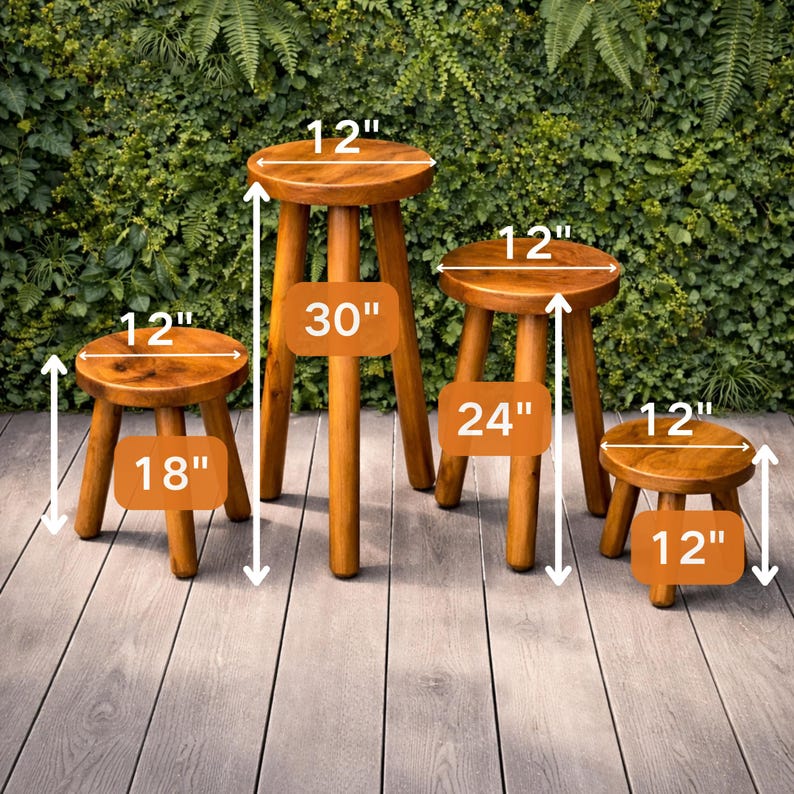 May include: Four wooden stools of varying heights. The tallest stool is 30 inches high, with a 12-inch diameter seat. The other stools are 24 inches, 18 inches, and 12 inches high, all with 12-inch diameter seats. The stools are made of light brown wood.