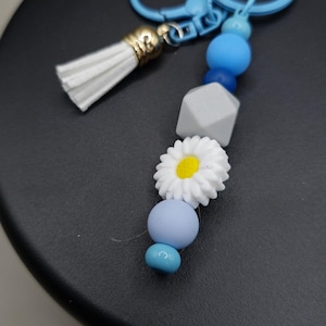 white flower key ring