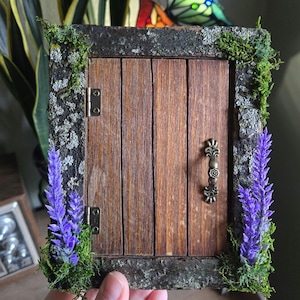 Lavender fairy door that opens