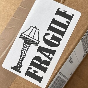 25 Small Leg Lamp Fragile Shipping Stickers. 2.31 x 4 inches. Handle With Care Sticker. Fragile Label. Shipping Sticker. Shipping Supplies.