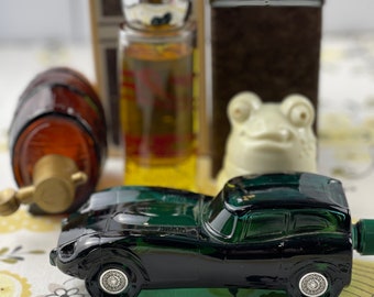 Set of Vintage Avon Colognes. Clint Desk Caddy. Wild Country After Shave Jaguar Car. Barrel On Tap Bottle.