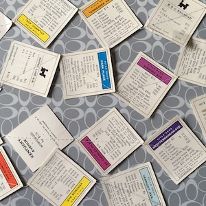 Guirnalda de papel / Cartas de Monopoly / Hechas a mano / 2,7 metros / Vintage / Recuperadas / Decoraciones para fiestas