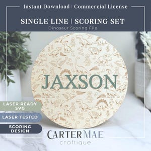 May include: A round wooden sign featuring a dinosaur pattern and the name "JAXSON" in green text. The sign is laser ready and laser tested. The sign is for scoring and is a single line design.