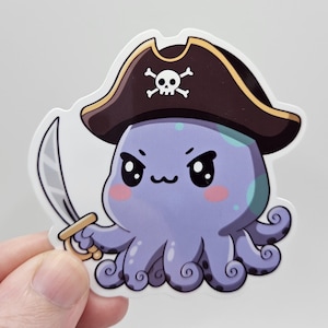 May include: A sticker featuring a cartoon octopus pirate. The octopus is purple with a brown pirate hat and a skull and crossbones. It holds a silver sword and has an angry expression.