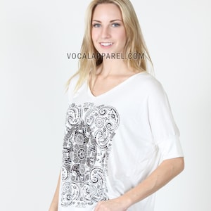 Vocal Apparel Women's White Short Sleeve Top with Embellished Black Floral Print