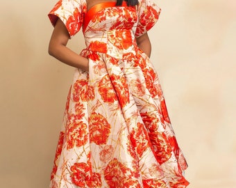 Brocade flare dress with side pockets.