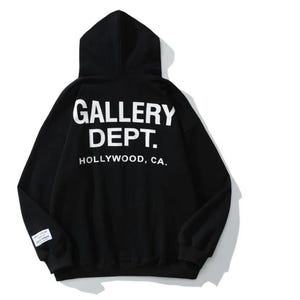 May include: Black hooded sweatshirt featuring the white text "GALLERY DEPT. HOLLYWOOD, CA." on the back. The sweatshirt has a hood and a small label on the sleeve.