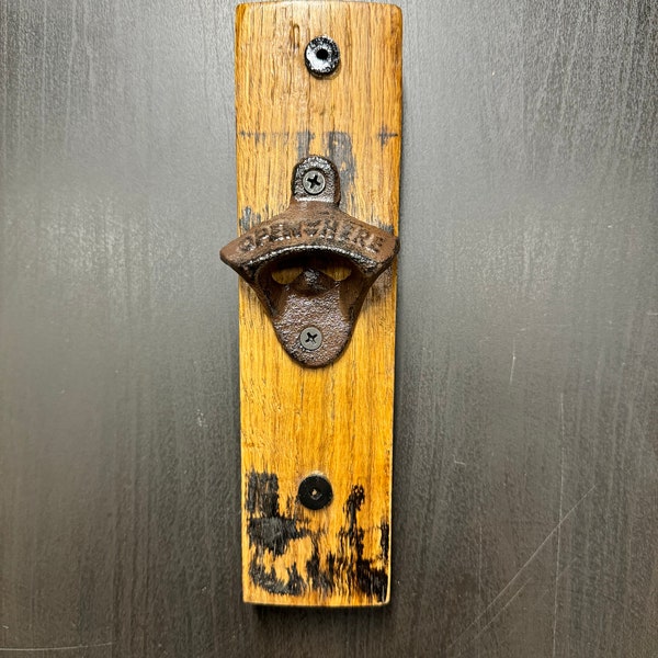 Barrel Stave wall mounted bottle opener labeled “Open Here” with mounting holes.