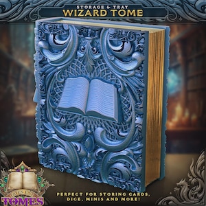 May include: A blue Wizard Tome storage box with detailed carvings and gold edges. The text "STORAGE & TRAY WIZARD TOME" is at the top. The bottom text reads "PERFECT FOR STORING CARDS, DICE, MINIS AND MORE!" The box features a carved open book design.