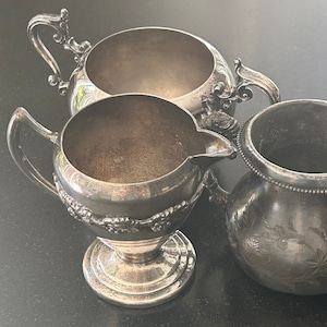 Set of Four Pieces of Silver Sugars, Creamer and Vase