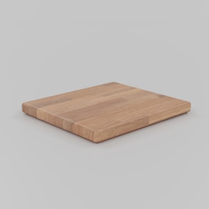 May include: A rectangular wooden cutting board made of light brown wood.