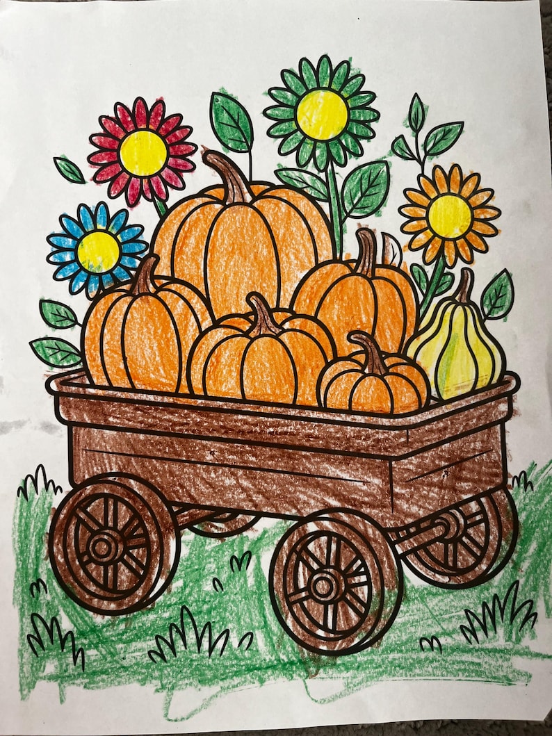 May include: A colorful drawing of a wooden wagon filled with orange pumpkins and a yellow pear. The wagon is surrounded by green grass and colorful flowers with red, blue, and yellow centers. The image is a child's drawing.