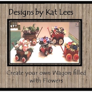 May include: Four miniature red wagons filled with colourful paper flowers. The wagons have wooden wheels and are arranged on a white surface. The text "Create your own Wagon filled with Flowers" is below the wagons.