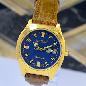 Reloj automático vintage Citizen 8200A con esfera azul, fecha y día, 21 joyas, para hombre, fabricado en Japón.