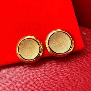 vintage Crown Trifari clip on earrings gold tone