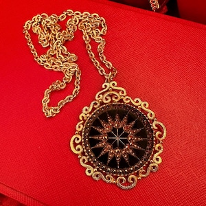 vintage heraldic pendant necklace ornate Victorian revival, gold and black tone
