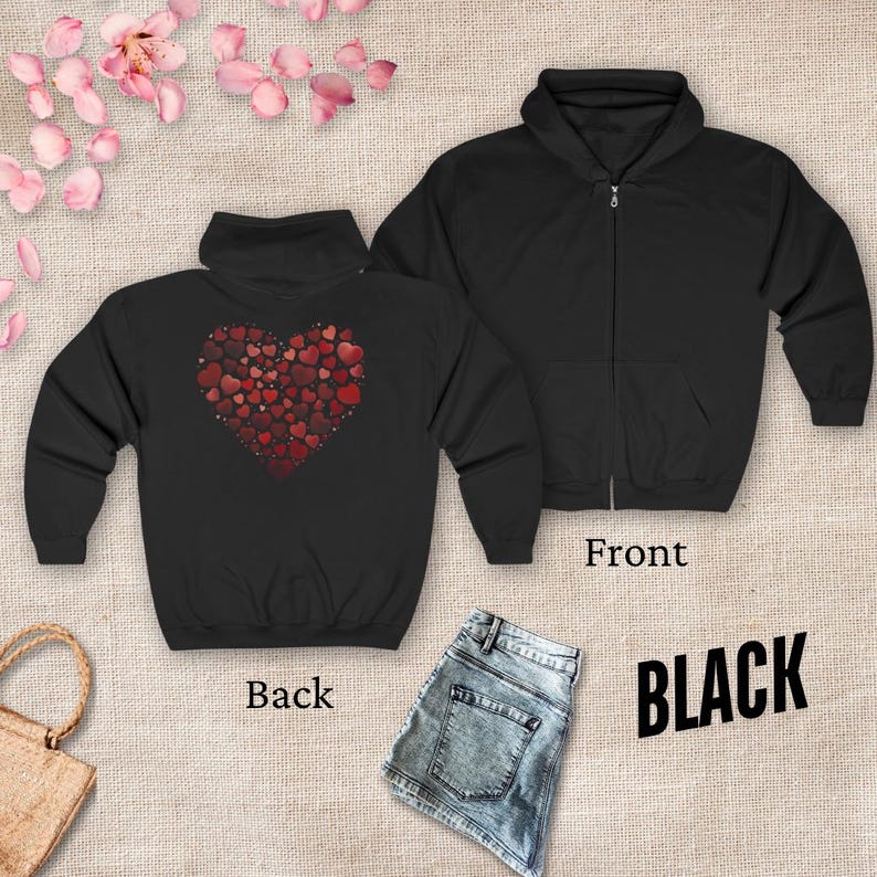 May include: Black zippered hoodie with a large red heart made of smaller hearts on the back. The front of the hoodie is plain black.
