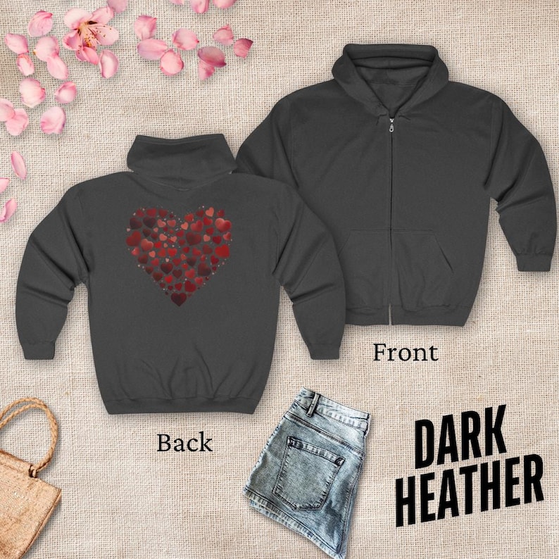 May include: Dark heather grey zippered hoodie with a large red heart made of smaller hearts on the back. The front of the hoodie is plain.