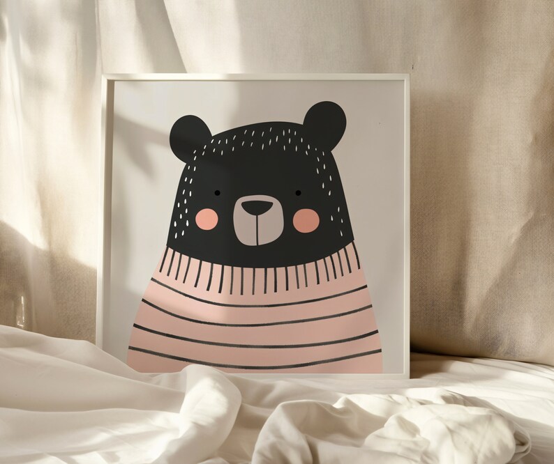 May include: A black bear wearing a pink and white striped sweater. The bear has a cute, cartoon-like face with black eyes, a brown nose, and pink cheeks.