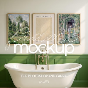 May include: Three framed pictures hanging on a white wall above a white bathtub with gold fixtures. The pictures are in wooden frames and feature nature scenes. The text "WILLIAM MORRIS" is visible on the middle picture.