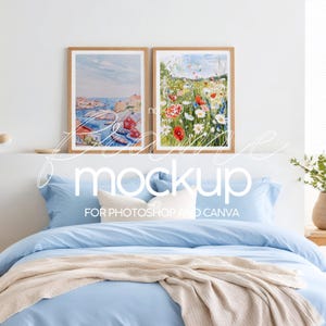 May include: Two framed watercolor paintings hanging above a light blue bed with a white pillow and a beige throw blanket. The painting on the left depicts a seascape with red houses and boats. The painting on the right depicts a field of wildflowers with red poppies.