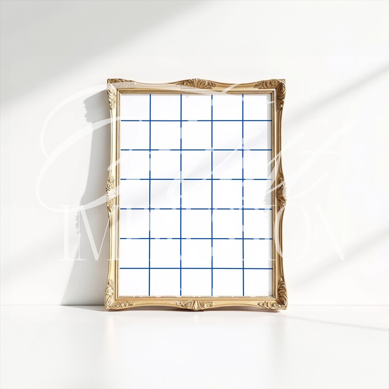 May include: A gold-framed grid board with a white background and blue lines. The board is perfect for displaying photos, notes, or other items.