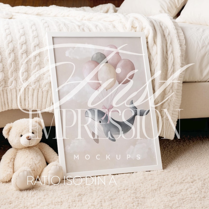 May include: A white framed print with a watercolor illustration of a whale holding onto pink, white, and gray balloons. The whale is flying in the sky with clouds. The text "MOCKUPS" is printed below the whale.