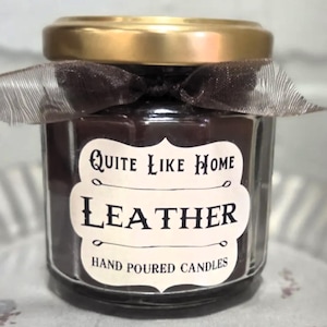 Leather scented 4 oz. jar candle with gold lid, and organza ribbon. Manly, men, leather and lace, groomsman gift, cowboy, saddle, father